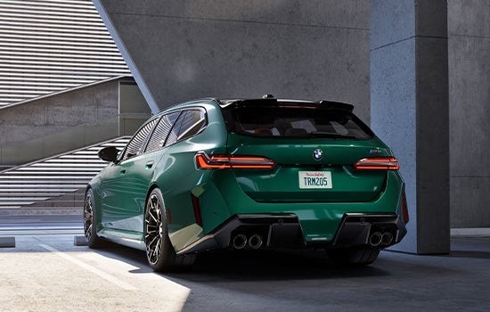 Green BMW M5 Touring parked in garage. | Zeigler BMW in Kalamazoo MI