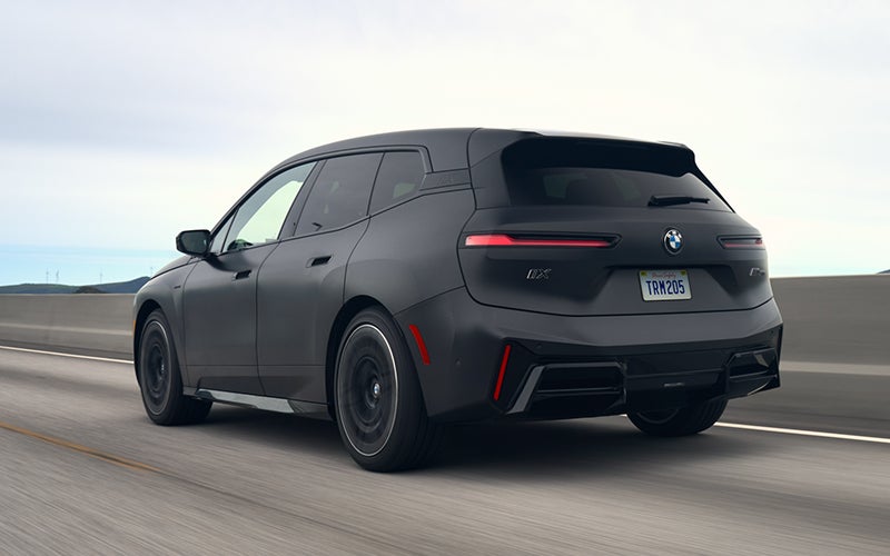 The BMW iX M70 driving rear shot. | Zeigler BMW in Kalamazoo MI